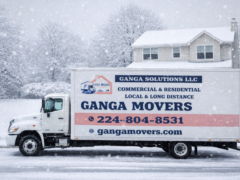 Movers wrapping furniture with blankets